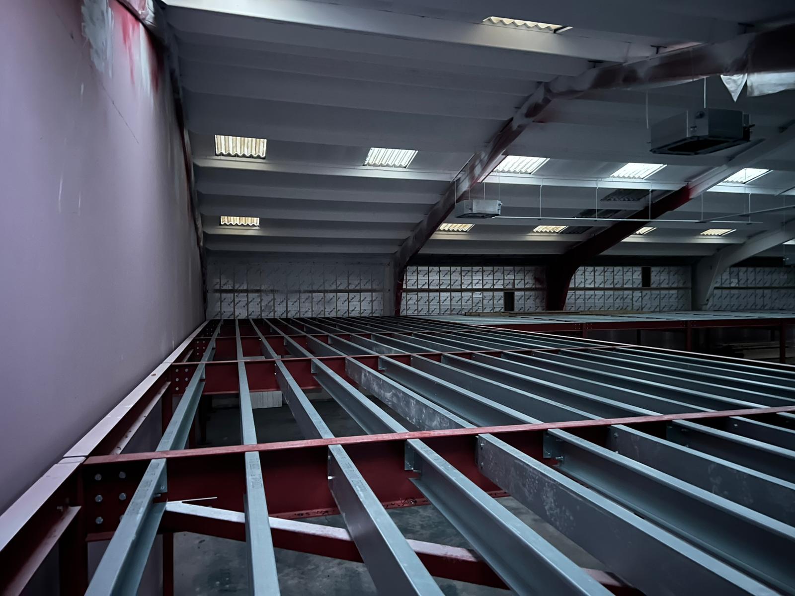 Steel joist floor deck for a new mezzanine level