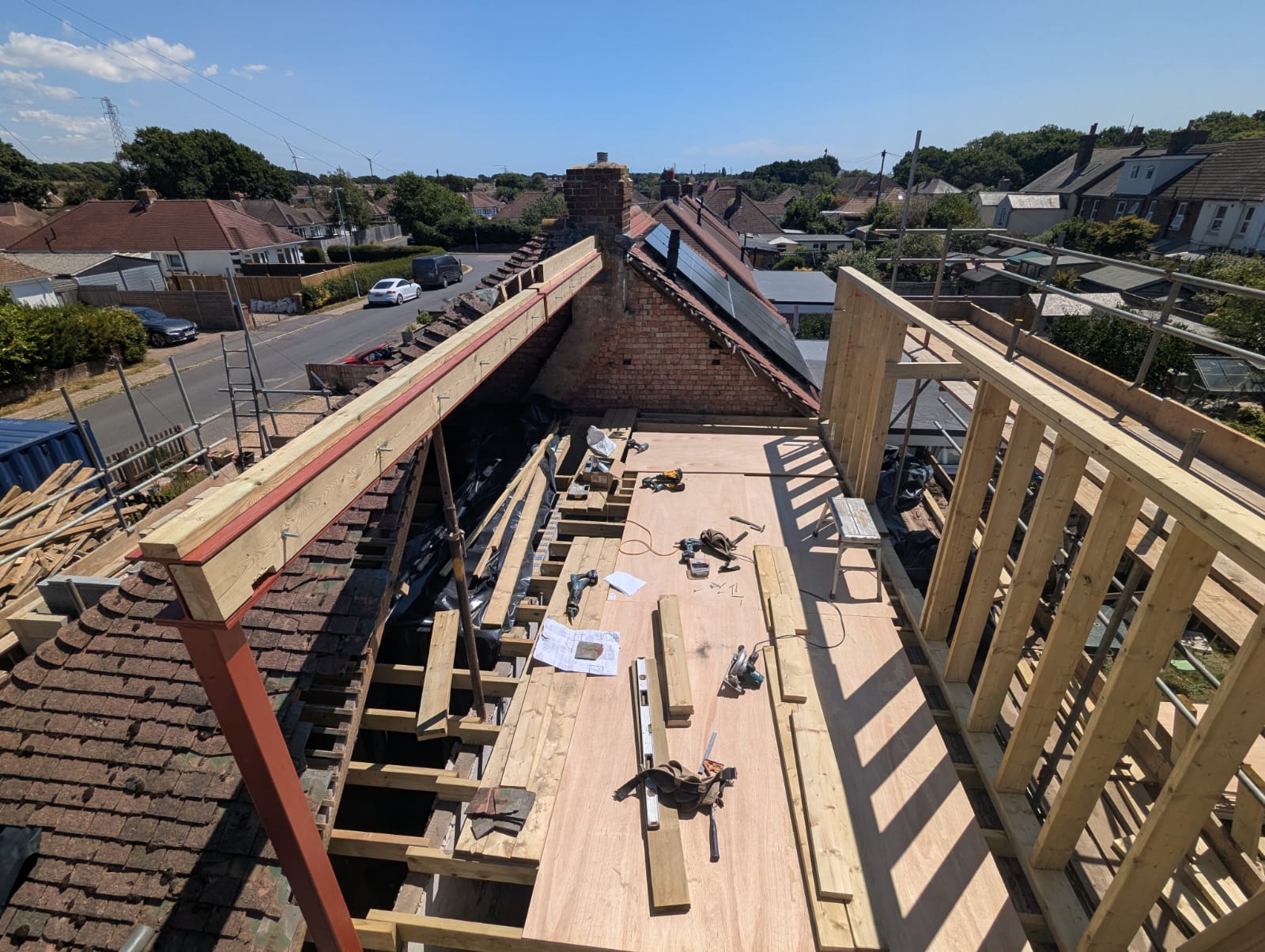Loft conversion steelwork with a new beam and floor joists in the roof